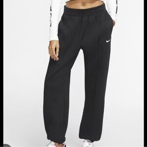 Nike Black Sweatpants with Tapered Fit and Ribbed Ankles